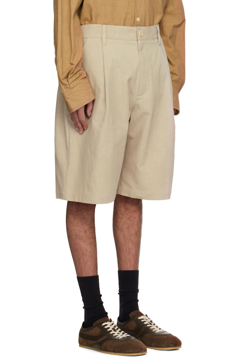 Loose-fit washed cotton- and ramie-blend canvas shorts. 

· Belt loops
· Partially elasticized waistband
· Four-pocket styling
· Lampo zip fly
· Pleats at front
· Horn hardware

Supplier color: Natural