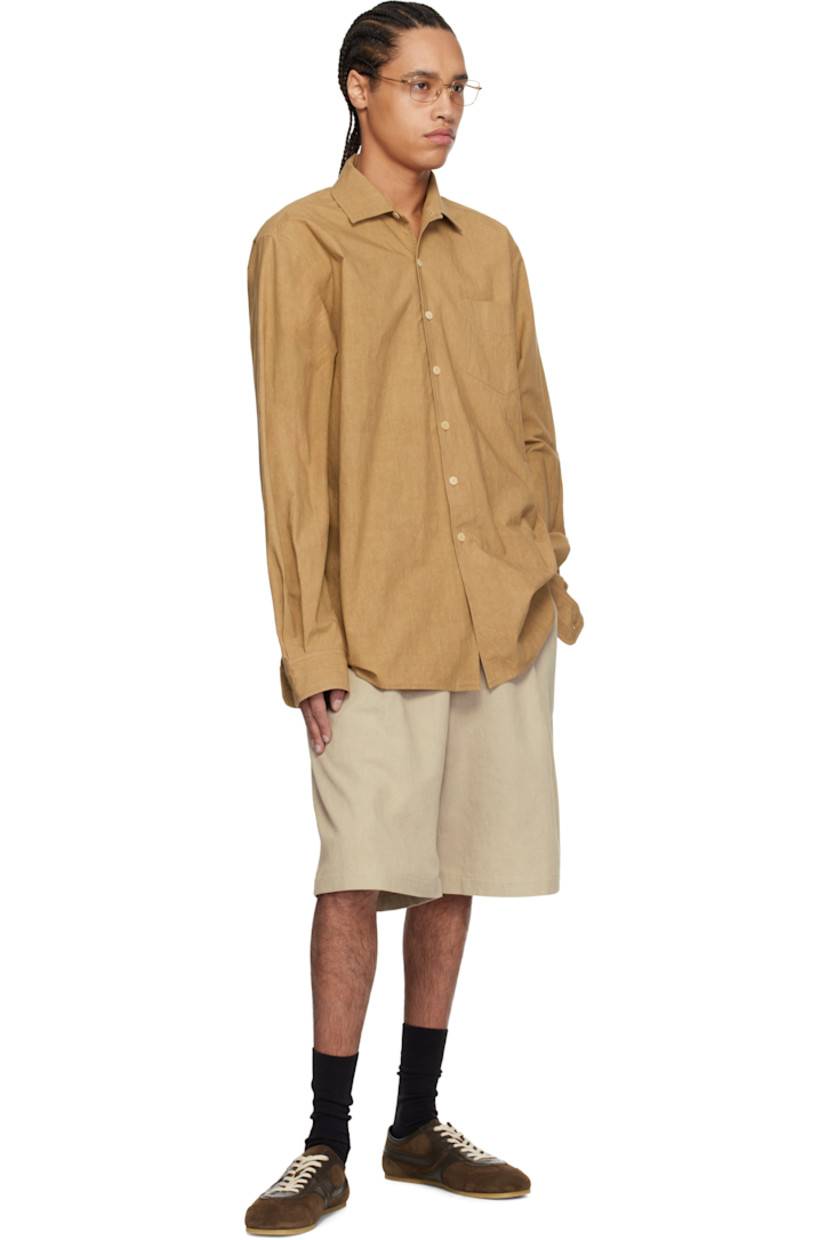 Loose-fit washed cotton- and ramie-blend canvas shorts. 

· Belt loops
· Partially elasticized waistband
· Four-pocket styling
· Lampo zip fly
· Pleats at front
· Horn hardware

Supplier color: Natural