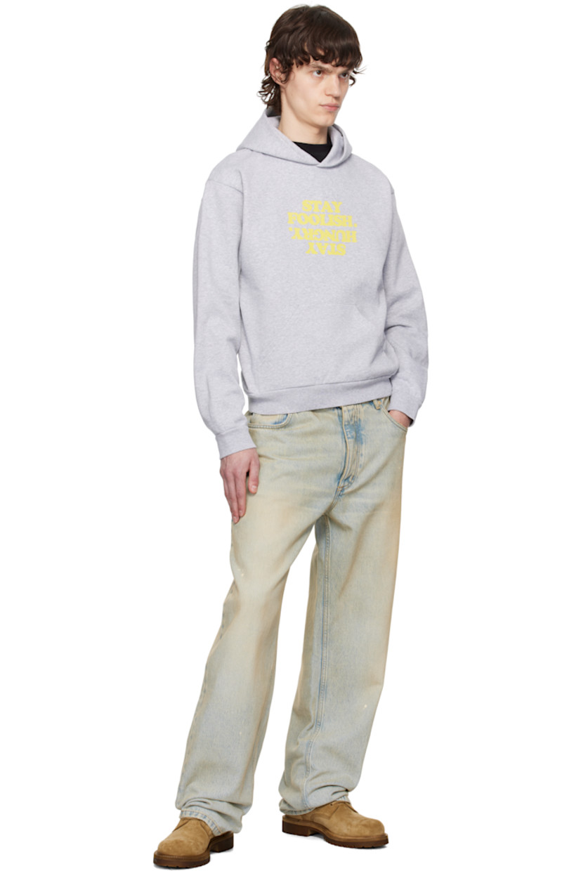 Cotton fleece hoodie.

· Text printed at chest
· Kangaroo pocket
· Rib-knit hem and cuffs 
· Dropped shoulders

Supplier color: Grey/Yellow print