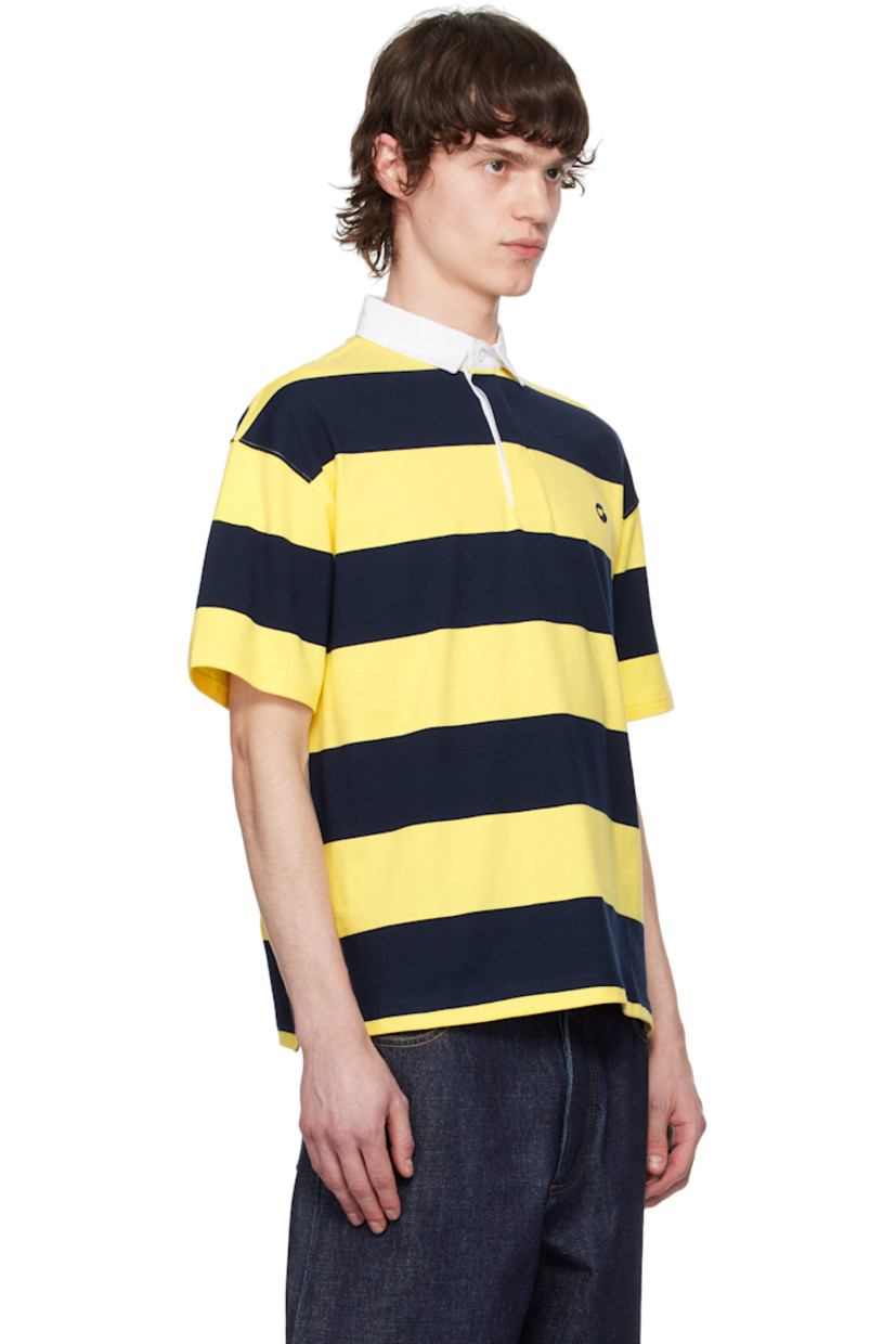 Cotton jersey polo. Stripes throughout.

· Cotton twill spread collar
· Concealed three-button placket
· Logo embroidered at chest
· Vented side seams
· Dropped shoulders

Supplier color: Yellow/Blue