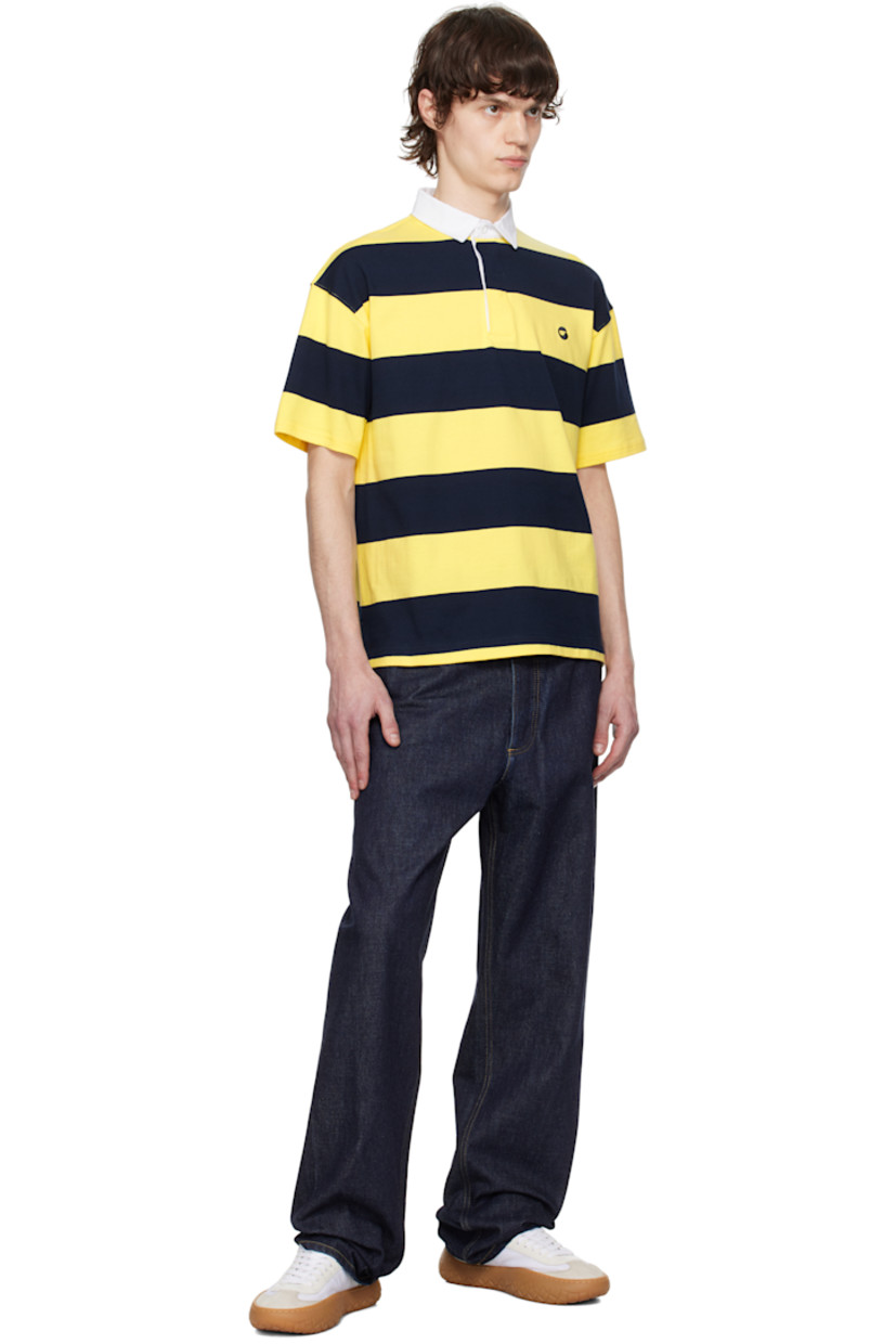 Cotton jersey polo. Stripes throughout.

· Cotton twill spread collar
· Concealed three-button placket
· Logo embroidered at chest
· Vented side seams
· Dropped shoulders

Supplier color: Yellow/Blue