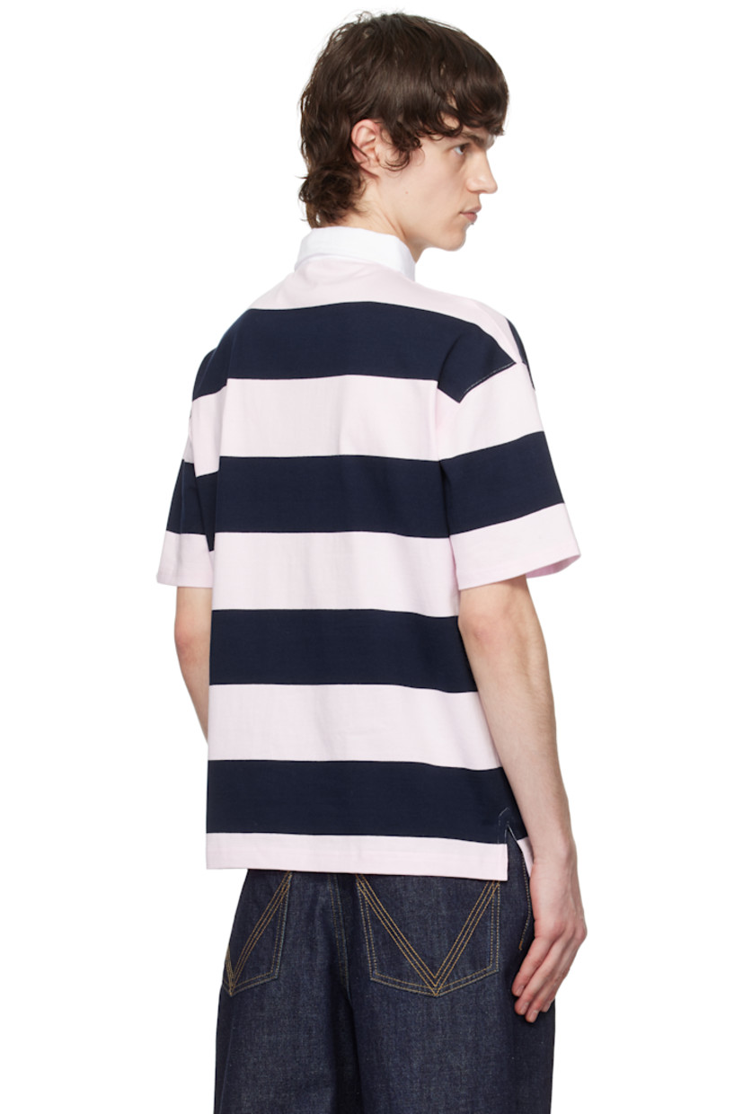 Cotton jersey polo. Stripes throughout.

· Cotton twill spread collar
· Concealed three-button placket
· Logo embroidered at chest
· Vented side seams
· Dropped shoulders

Supplier color: Pink/Blue