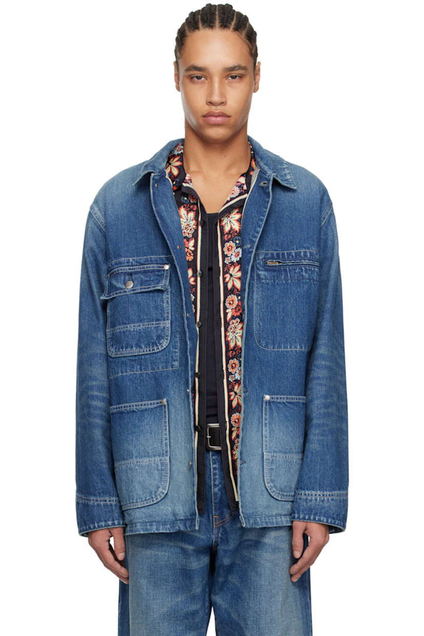 14 oz non-stretch selvedge denim jacket. Fading throughout.

· Spread collar
· Button closure
· Flap and zip pocket at chest
· Patch pockets
· Adjustable button fastening at cuffs
· Pocket at interior

Supplier color: Bleached indigo