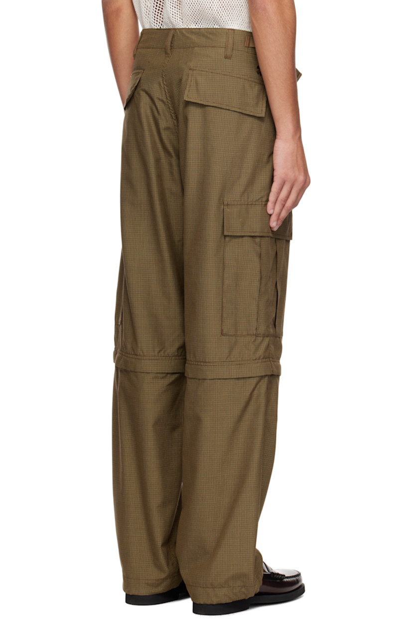Plain-woven silk cargo pants. Check pattern throughout.

· Belt loops
· Four-pocket styling
· Zip fly
· Cinch straps at waistband
· Zip fastening at knees for shorts styling
· Drawstring at cuffs
· Flap pocket at outseams
· Logos embroidered at back
· Buffalo horn hardware

Supplier color: Brown