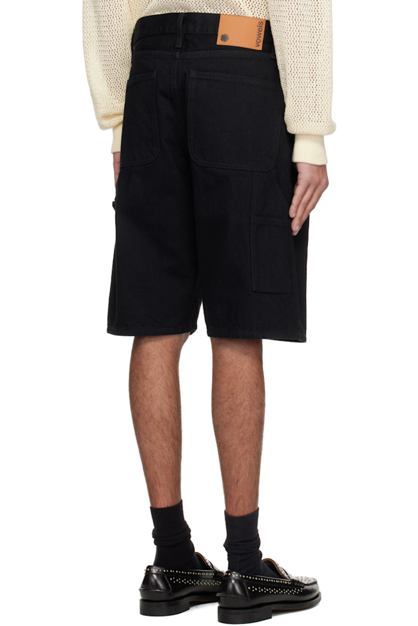 Non-stretch denim shorts. 

· Belt loops
· Five-pocket styling 
· Zip fly
· Logo flag at coin pocket
· Hammer loop at outseam
· Patch pockets at outseam
· Logo patch at back waistband

Supplier color: Black