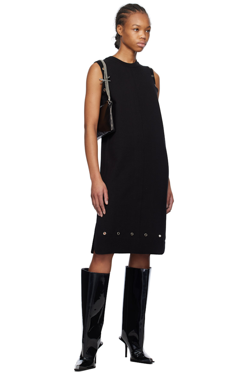 Knit cotton mini dress.

· Rib-knit crewneck, hem, and armscyes
· Pinched seam at front and back
· Eyelets at hem and armscyes
· Vented side seams

Supplier color: Black