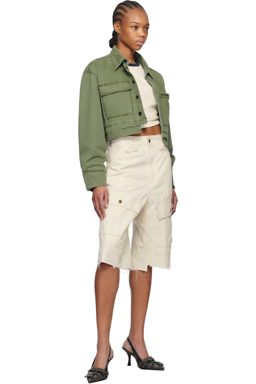 Cotton canvas jacket.

· Spread collar
· Concealed button closure
· Logo embroidered at chest
· Flap and patch pocket
· Cropped hem
· Dropped shoulders
· Single-button cuffs
· Full cotton-blend poplin lining
· Logo-engraved black hardware
· Contrast stitching in black

Supplier color: Khaki