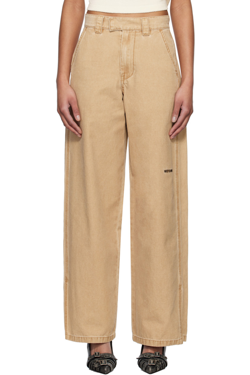 Cotton canvas trousers. Fading throughout.

· Mid-rise
· Belt loops
· Four-pocket styling
· Zip fly
· Logo embroidered at leg
· Vented outseams

Supplier color: Beige