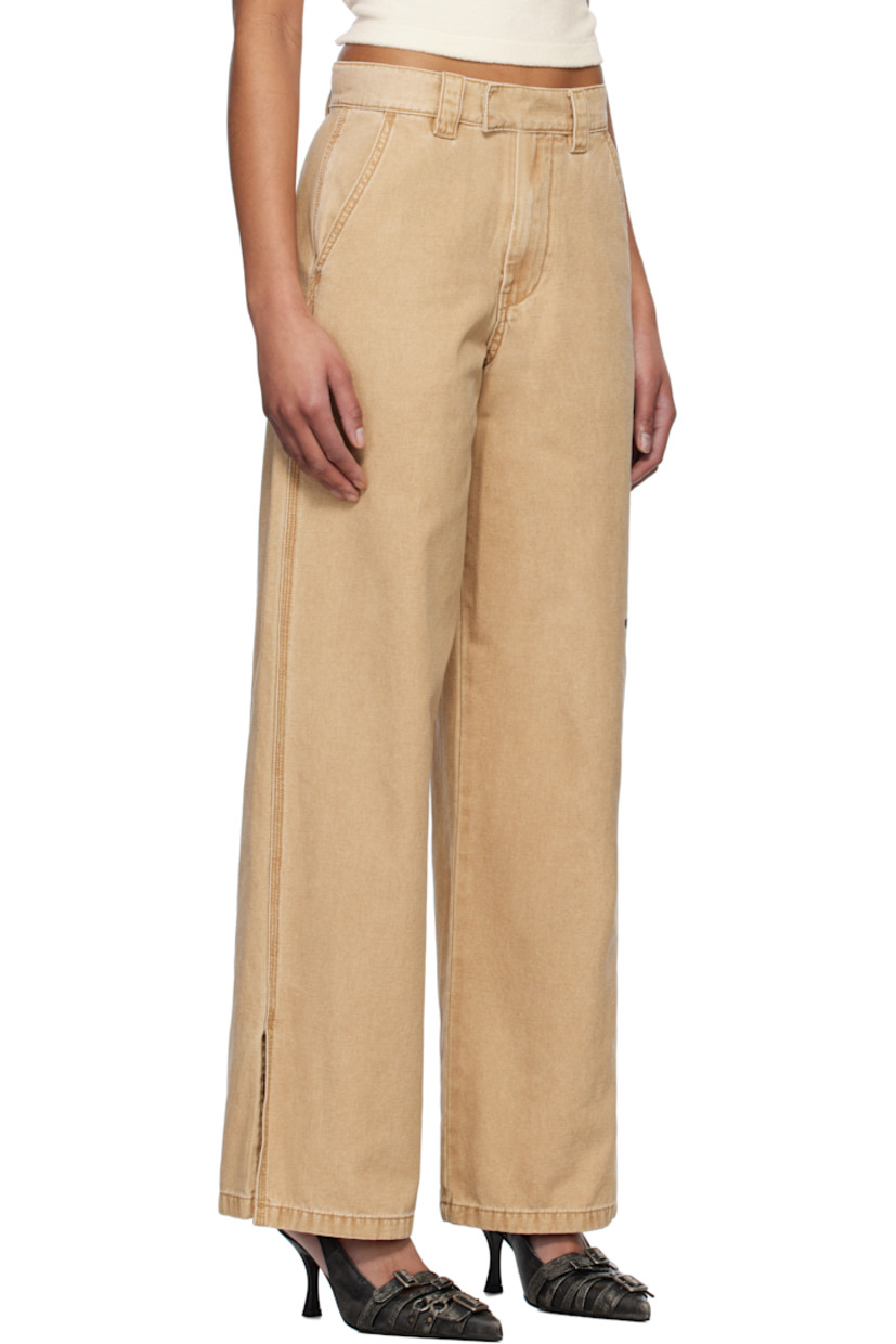 Cotton canvas trousers. Fading throughout.

· Mid-rise
· Belt loops
· Four-pocket styling
· Zip fly
· Logo embroidered at leg
· Vented outseams

Supplier color: Beige