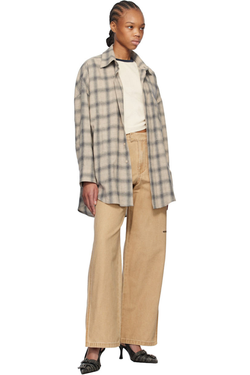 Cotton canvas trousers. Fading throughout.

· Mid-rise
· Belt loops
· Four-pocket styling
· Zip fly
· Logo embroidered at leg
· Vented outseams

Supplier color: Beige