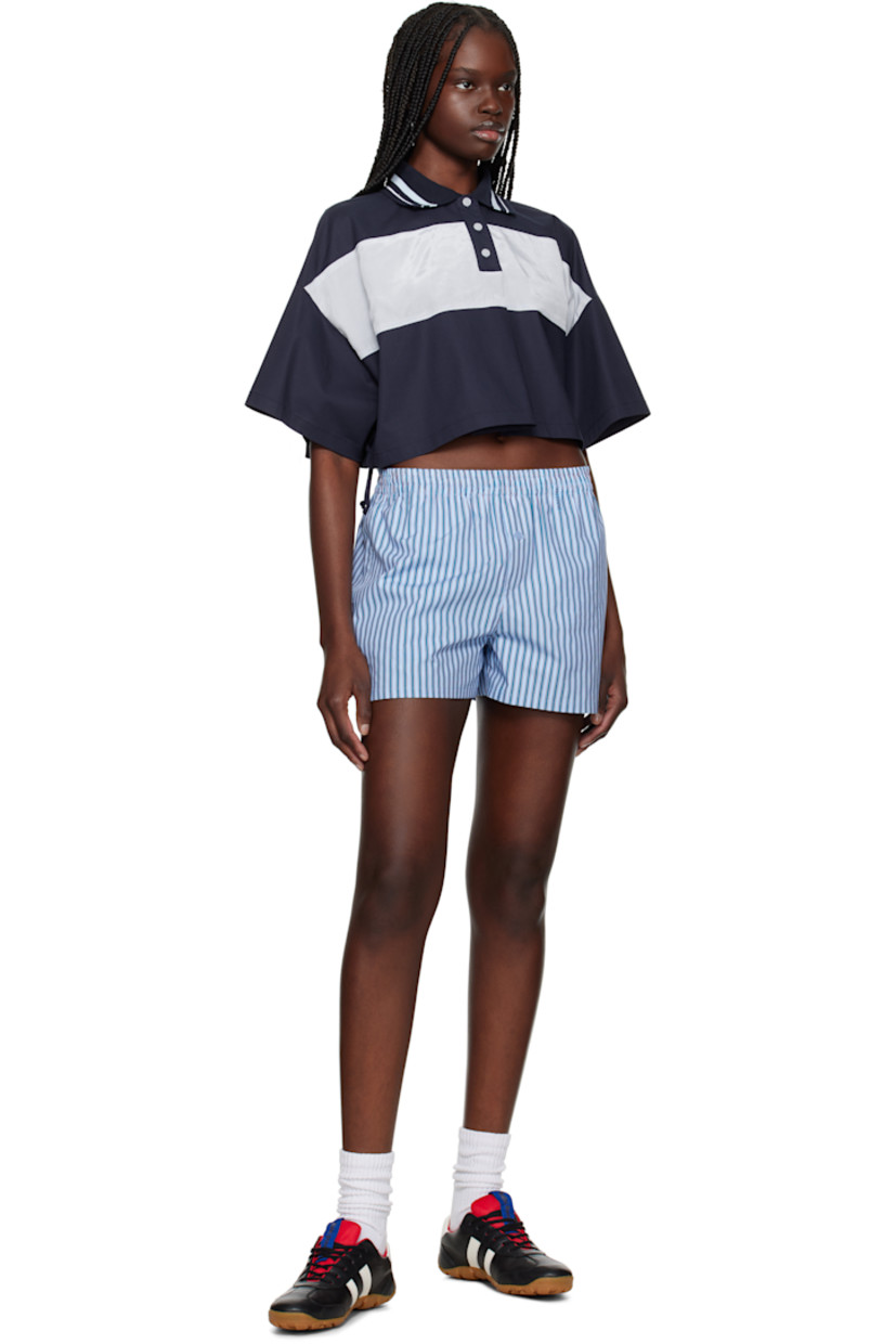 Cotton poplin shorts. Stripes and logo pattern printed throughout.

· Concealed drawstring at elasticized waistband
· Two-pocket styling
· Button fly
· Fully lined

Supplier color: Blue