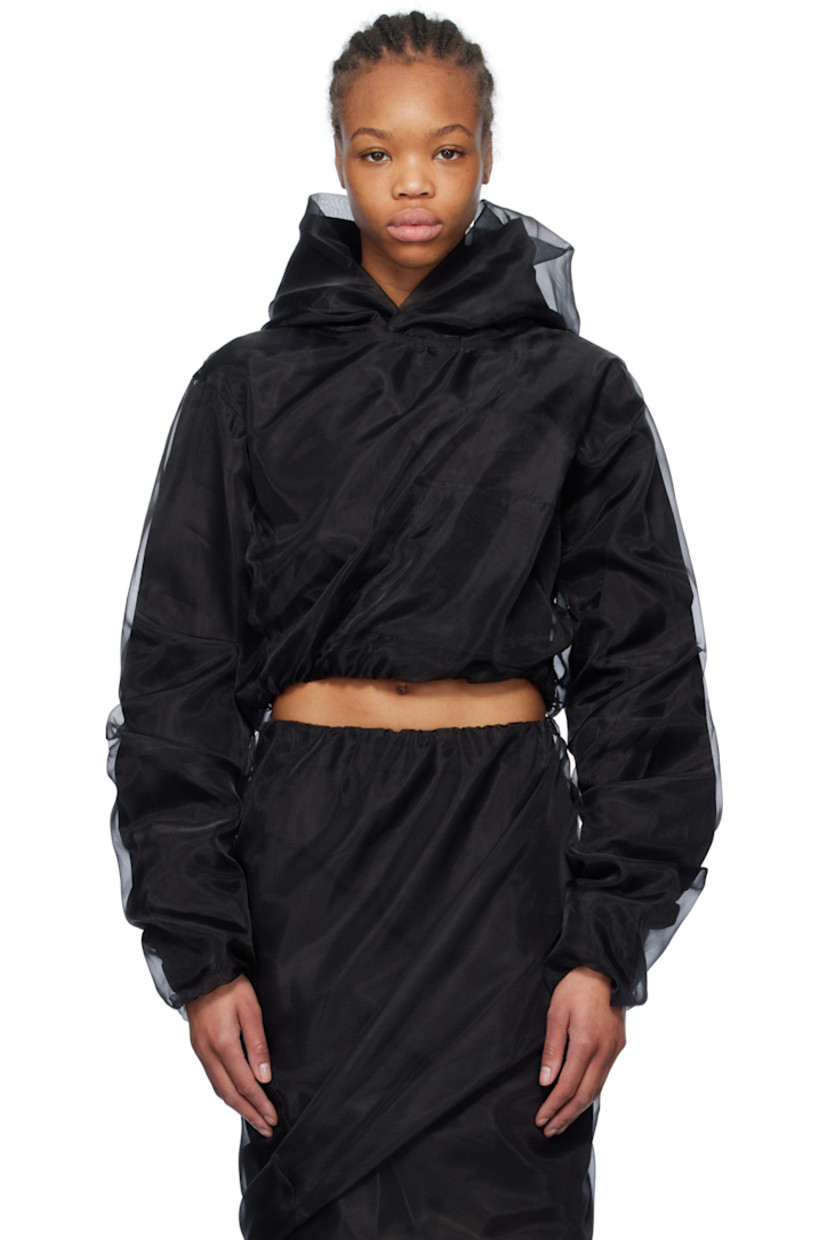 Polyester tulle and cotton-blend poplin hoodie. Gathering throughout.

· Layered construction 
· Kangaroo pocket
· Cropped bubble hem
· Elasticized hem and cuffs

Supplier color: Black