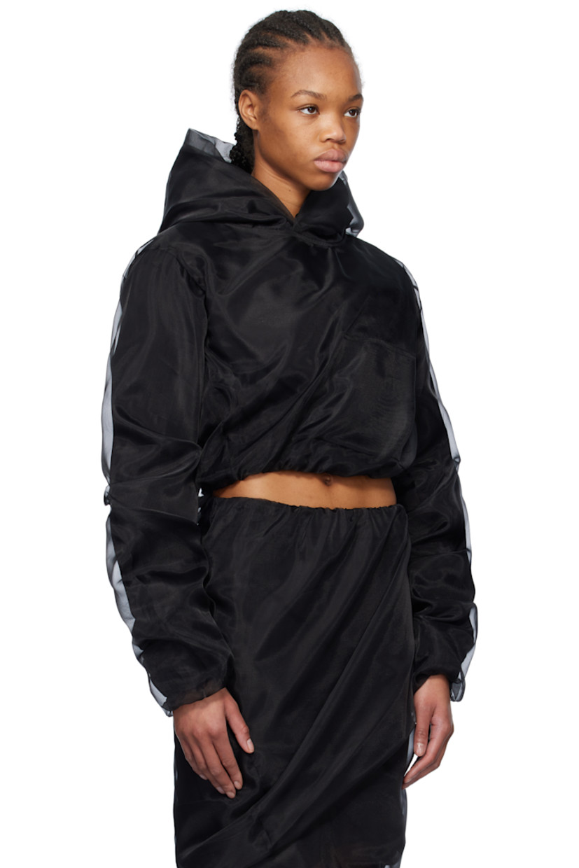 Polyester tulle and cotton-blend poplin hoodie. Gathering throughout.

· Layered construction 
· Kangaroo pocket
· Cropped bubble hem
· Elasticized hem and cuffs

Supplier color: Black