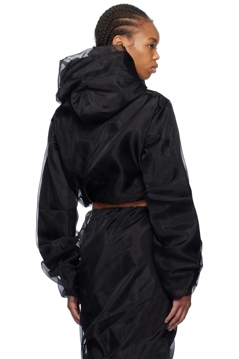 Polyester tulle and cotton-blend poplin hoodie. Gathering throughout.

· Layered construction 
· Kangaroo pocket
· Cropped bubble hem
· Elasticized hem and cuffs

Supplier color: Black