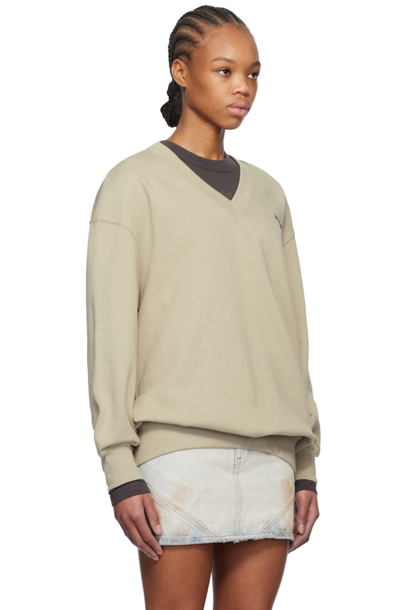 Cotton fleece sweatshirt.

· Rib-knit V-neck, hem, and cuffs
· Logo embroidered at chest
· Dropped shoulders

Supplier color: Khaki
