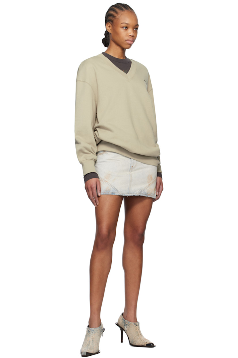 Cotton fleece sweatshirt.

· Rib-knit V-neck, hem, and cuffs
· Logo embroidered at chest
· Dropped shoulders

Supplier color: Khaki