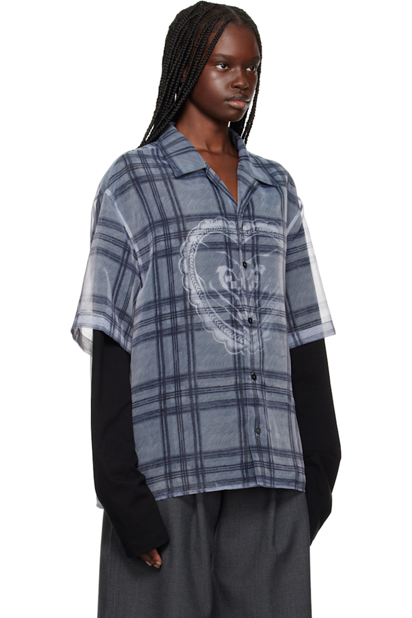Cotton jersey shirt. Integrated sheer organza shirt overlay.

· Check and logo pattern printed throughout
· Open spread collar
· Button closure
· Logo graphic printed at front

Supplier color: Grey