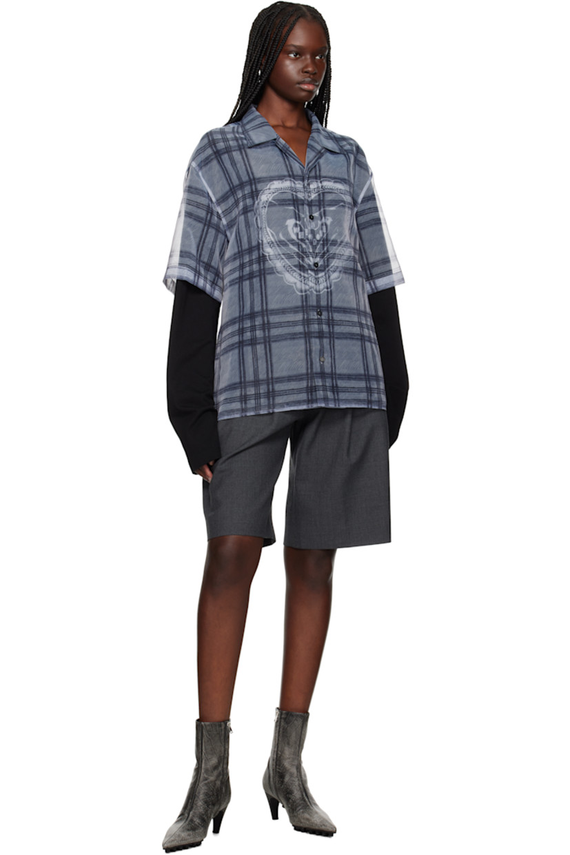 Cotton jersey shirt. Integrated sheer organza shirt overlay.

· Check and logo pattern printed throughout
· Open spread collar
· Button closure
· Logo graphic printed at front

Supplier color: Grey