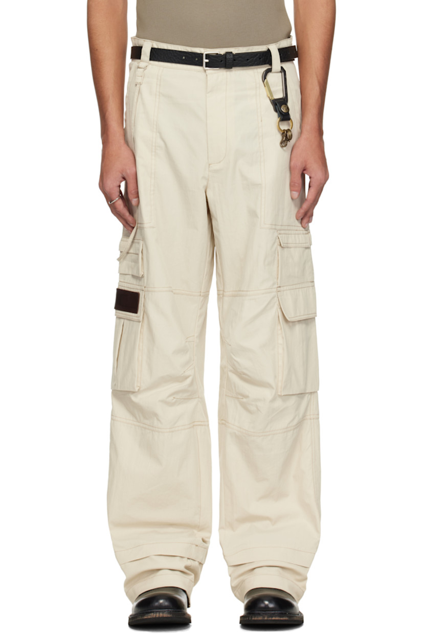 Cotton- and nylon-blend ripstop cargo pants.

· Belt loops
· D-ring with trim at belt loop extends to outseam
· Four-pocket styling
· Zip fly
· Stretch cotton canvas trim at cuffs
· Cargo pocket at outseams
· Zip pocket and leather logo patch at outseam
· Flap pockets at outseam
· Cinch tabs at back waistband
· Logo embroidered at back
· Unlined

Supplier color: Ecru