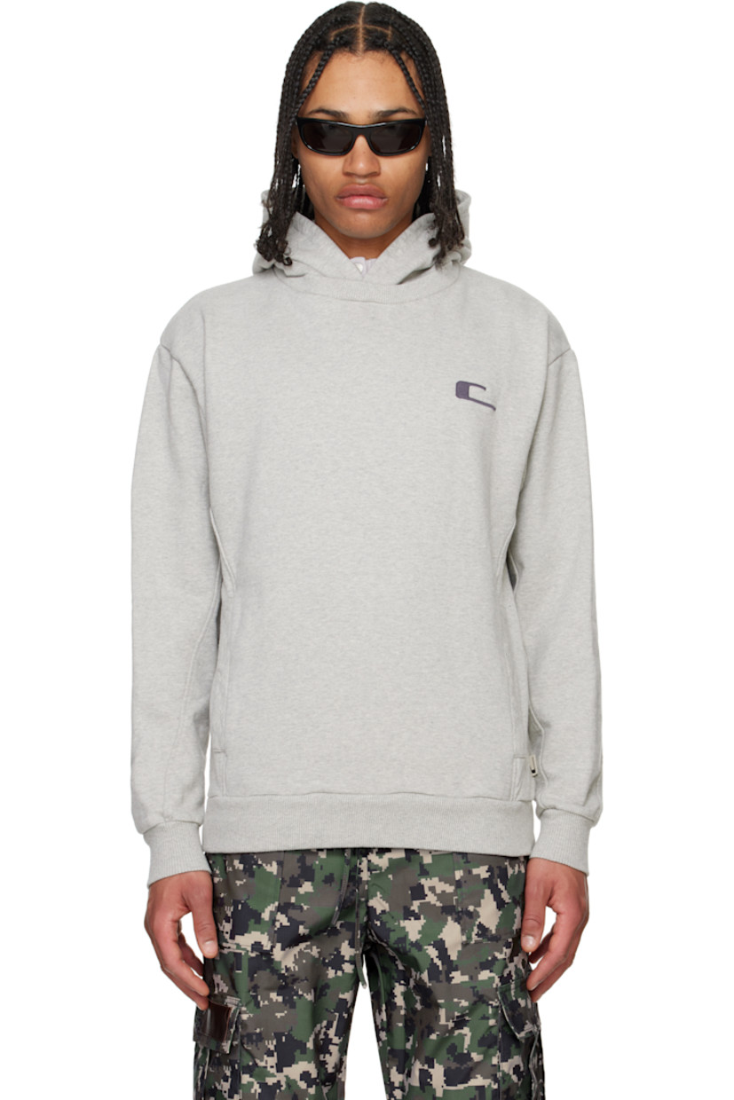 Heavyweight French terry hoodie. 

· Rib-knit crewneck
· Logo embroidered at chest
· Curved seams at front and back
· Welt pockets
· Rib-knit hem and cuffs
· Logo flag at side seam

Supplier color: Grey