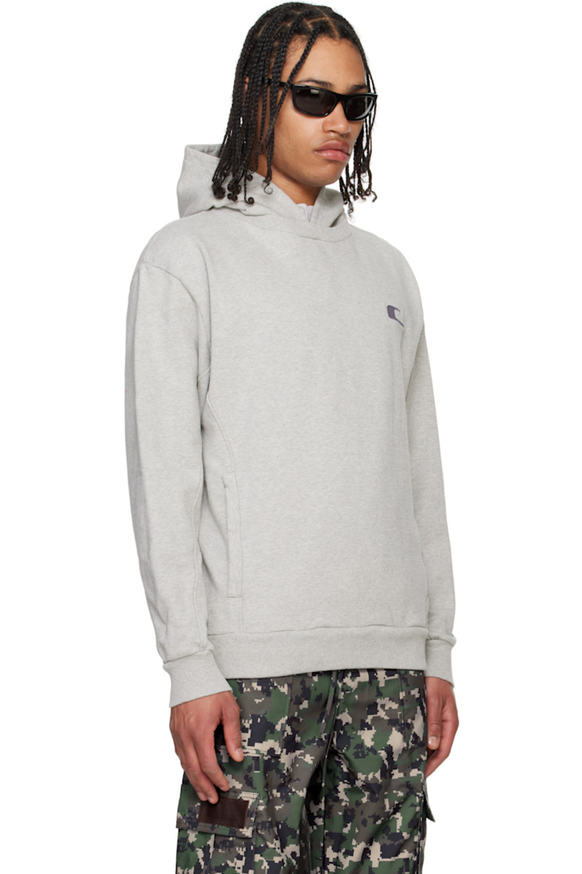 Heavyweight French terry hoodie. 

· Rib-knit crewneck
· Logo embroidered at chest
· Curved seams at front and back
· Welt pockets
· Rib-knit hem and cuffs
· Logo flag at side seam

Supplier color: Grey