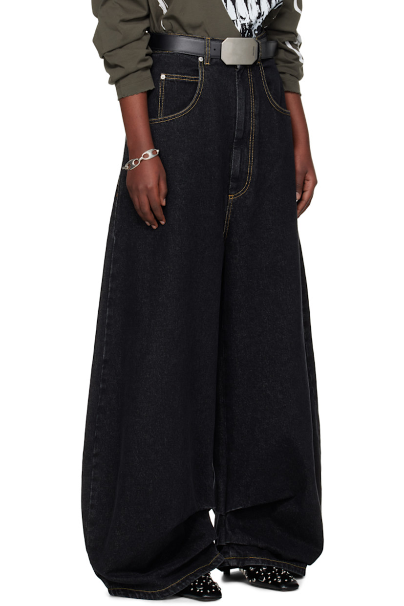 Non-stretch denim jeans. Fading throughout. 

· Belt loops
· Five-pocket styling
· Zip fly
· Logo patch at back waistband
· Logo graphic embroidered at back pockets 
· Logo-engraved silver-tone hardware 
· Contrast stitching in tan

Supplier color: Black