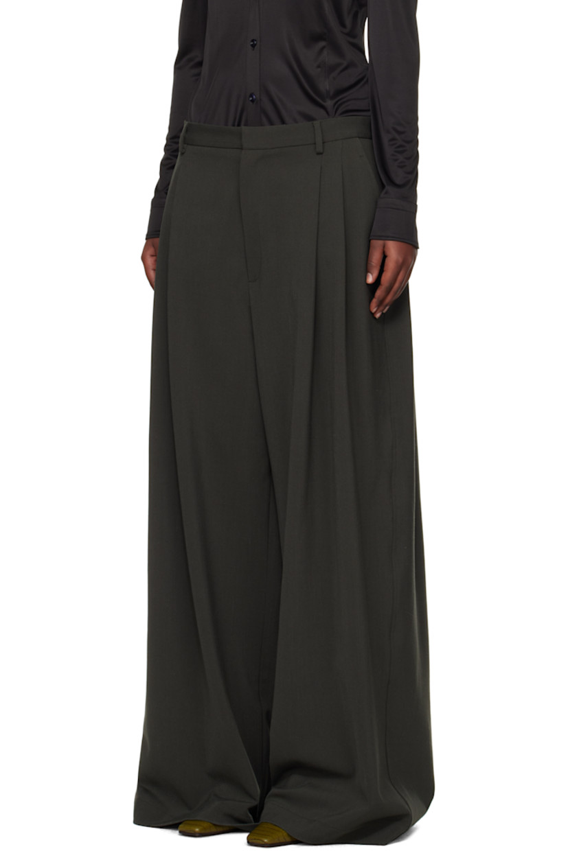 Wide-leg stretch polyester- and virgin wool-blend twill trousers.

· Lightweight
· Belt loops
· Four-pocket styling
· Zip fly
· Pleats at front 
· Partial satin lining 

Supplier color: Military grey
