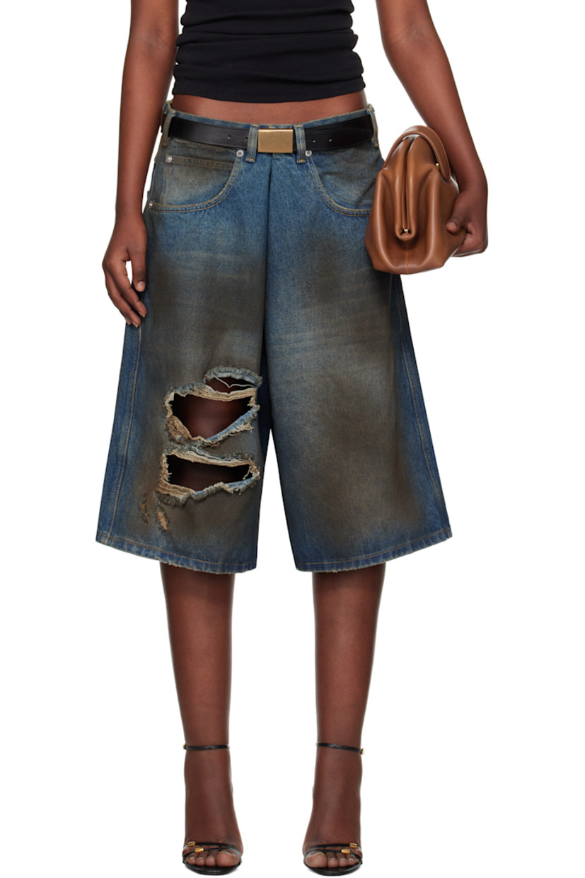 Non-stretch denim shorts. Smudging and fading throughout.

· Belt loops
· Five-pocket styling
· Zip-fly
· Rips at front
· Leather logo patch at back waistband
· Logo-engraved silver-tone hardware
· Contrast stitching in beige

Supplier color: Dirty blue