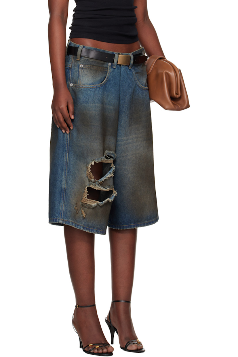 Non-stretch denim shorts. Smudging and fading throughout.

· Belt loops
· Five-pocket styling
· Zip-fly
· Rips at front
· Leather logo patch at back waistband
· Logo-engraved silver-tone hardware
· Contrast stitching in beige

Supplier color: Dirty blue