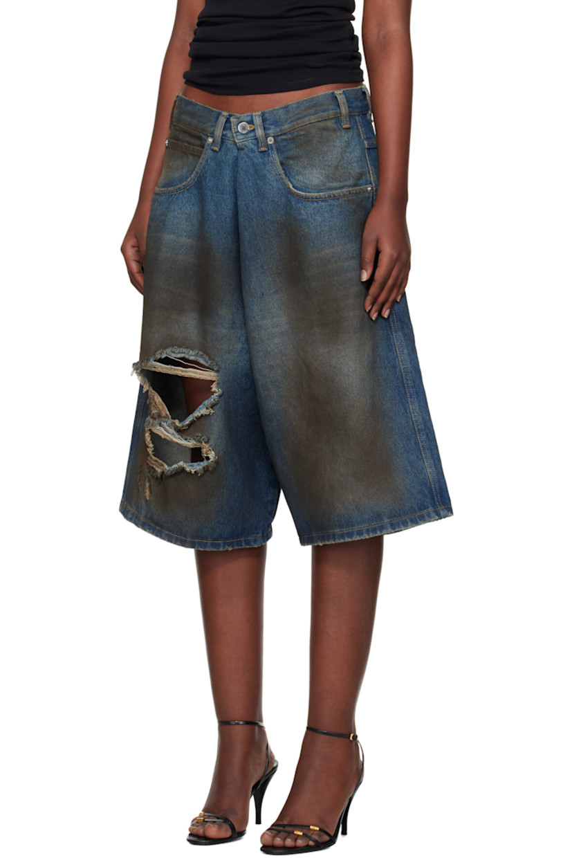 Non-stretch denim shorts. Smudging and fading throughout.

· Belt loops
· Five-pocket styling
· Zip-fly
· Rips at front
· Leather logo patch at back waistband
· Logo-engraved silver-tone hardware
· Contrast stitching in beige

Supplier color: Dirty blue
