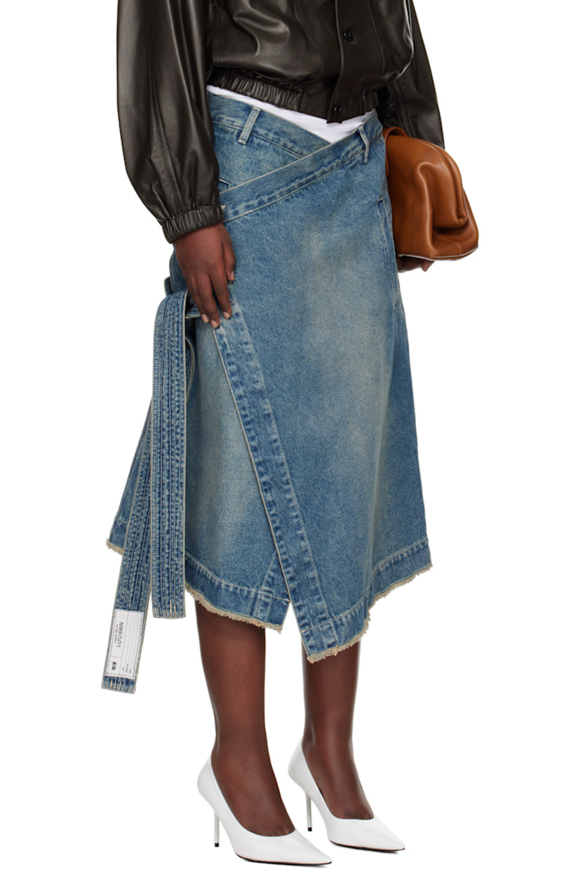 Loose-fit non-stretch denim midi skirt. Fading throughout

· Wrap construction
· Belt loops
· Four-pocket styling
· Adjustable button closure
· Self-tie fastening
· Frayed edge at hem
· Patch pockets at side seam
· Logo patch at back waistband
· Logo-engraved silver-tone hardware 
· Contrast stitching in white

Supplier color: Lawless blue