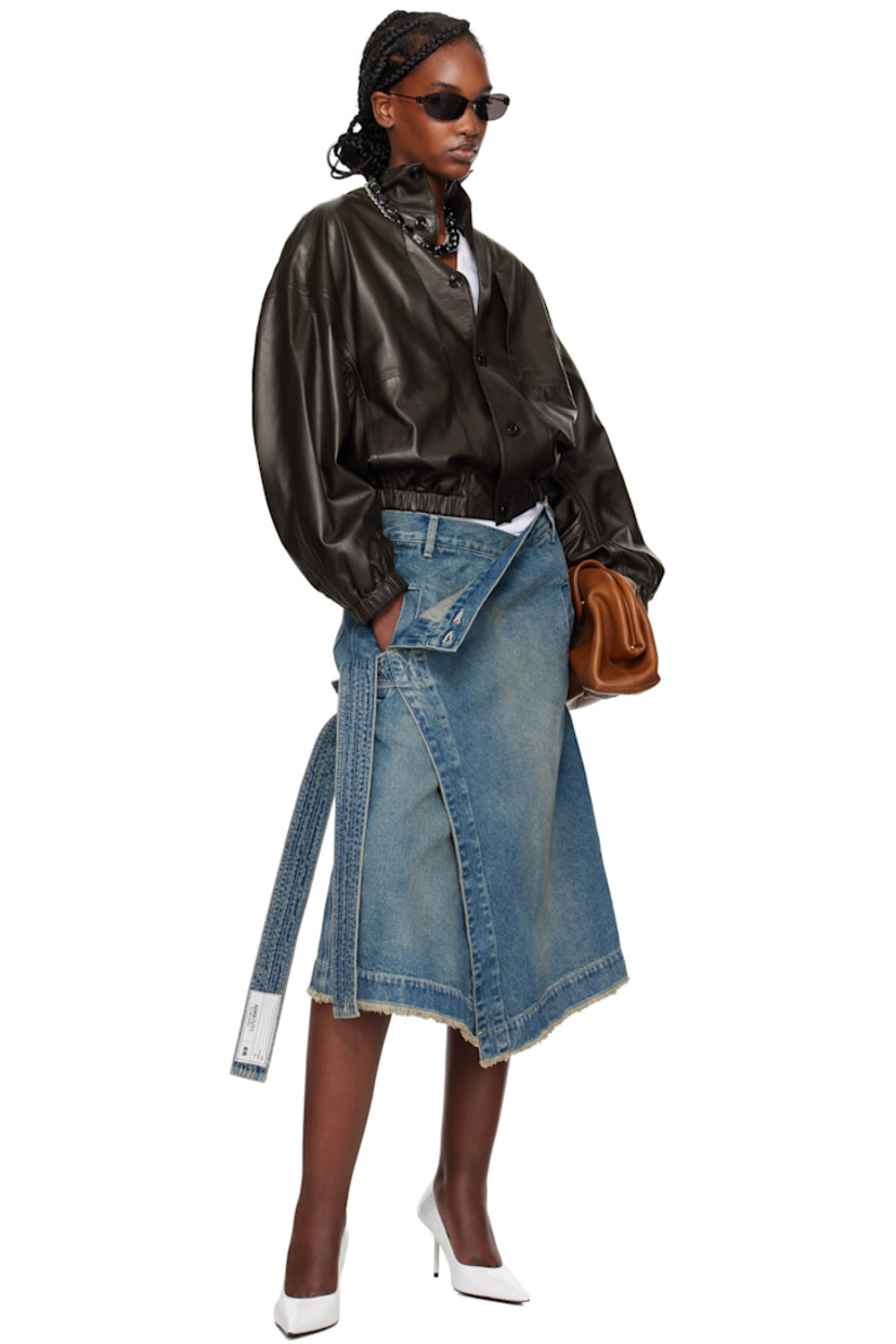 Loose-fit non-stretch denim midi skirt. Fading throughout

· Wrap construction
· Belt loops
· Four-pocket styling
· Adjustable button closure
· Self-tie fastening
· Frayed edge at hem
· Patch pockets at side seam
· Logo patch at back waistband
· Logo-engraved silver-tone hardware 
· Contrast stitching in white

Supplier color: Lawless blue