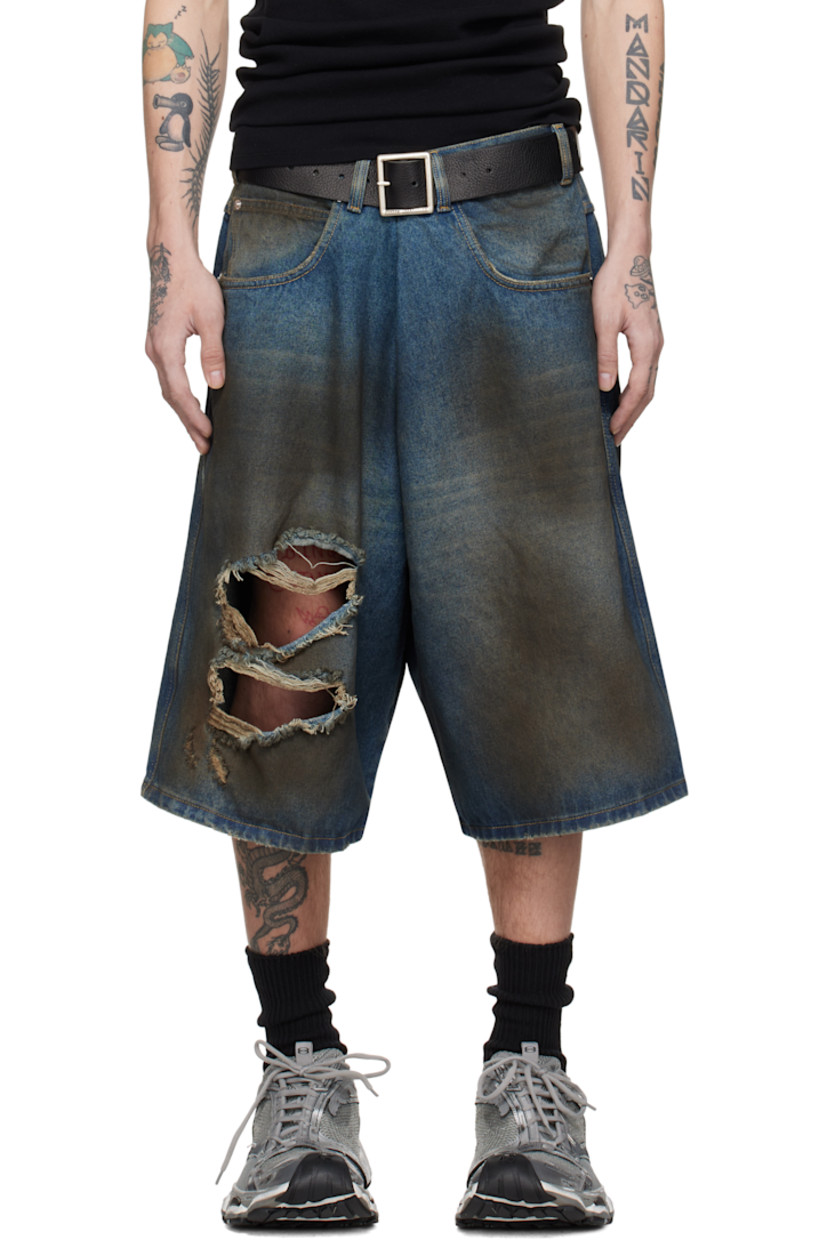 Non-stretch denim shorts. Smudging and fading throughout.

· Belt loops
· Five-pocket styling
· Zip-fly
· Rips at front
· Leather logo patch at back waistband
· Logo-engraved silver-tone hardware
· Contrast stitching in beige

Supplier color: Dirty blue