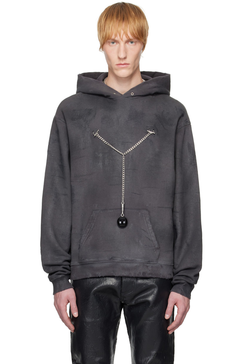Waxed cotton fleece hoodie. Fading and distressing throughout. 

· Grommets at hood
· O-rings at chest
· Detachable curb chain with charm 
· Kangaroo pocket
· Rib-knit hem and cuffs
· Dropped shoulders
· Logo embroidered at back collar
· Silver-tone and black hardware 

Supplier color: Charcoal