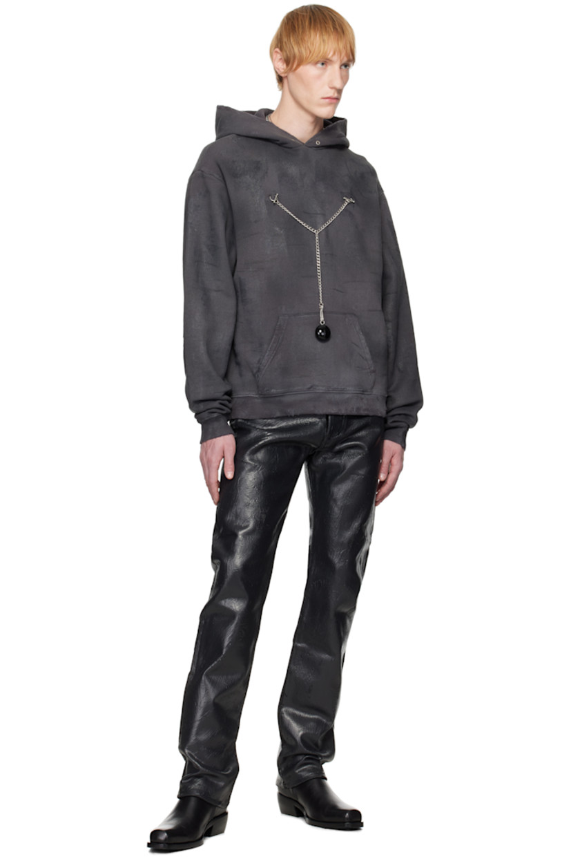 Waxed cotton fleece hoodie. Fading and distressing throughout. 

· Grommets at hood
· O-rings at chest
· Detachable curb chain with charm 
· Kangaroo pocket
· Rib-knit hem and cuffs
· Dropped shoulders
· Logo embroidered at back collar
· Silver-tone and black hardware 

Supplier color: Charcoal