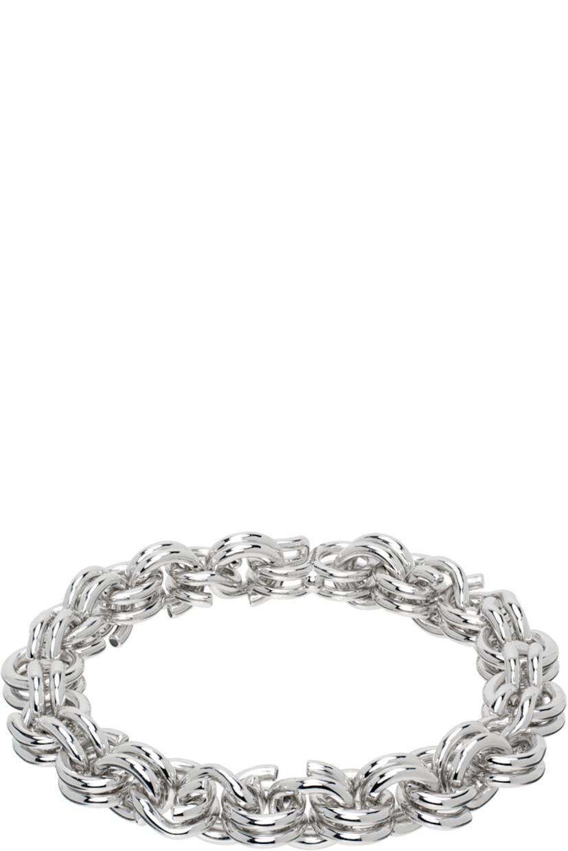 Rolo chain bracelet in sterling silver. 

· Hook-eye fastening 
· Full British hallmarking 
· L7.5"

Supplier color: 925 sterling silver