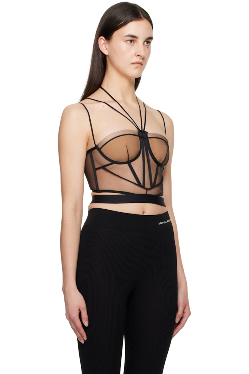 Sheer nylon tulle corset. Boning throughout.

· Adjustable halter straps
· Sweetheart neck
· Padding at cups
· Adjustable spaghetti straps
· Zip closure and hook-eye fastening at back

Supplier color: Black/Nude