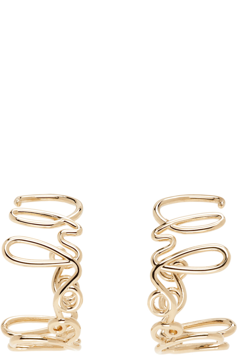 Pair of open hoop earrings in antiqued gold-tone brass.

· Logo throughout
· Post-stud fastening
· H1"

Supplier color: Vintage gold