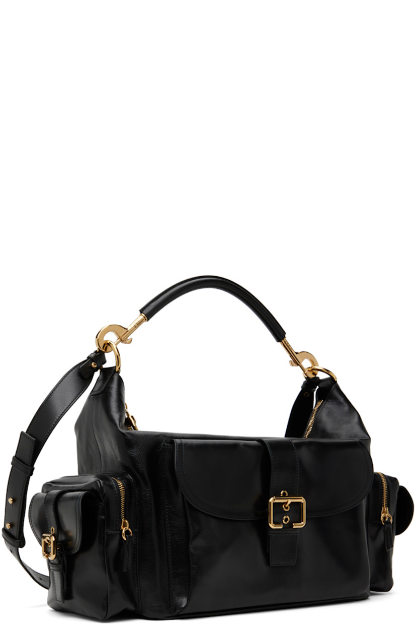 LWG-certified nappa buffalo leather shoulder bag in black.

· Detachable shoulder strap
· Detachable and adjustable post-stud crossbody strap
· Logo embossed at face
· Flap pocket at face
· Zip and flap pocket at sides
· Zip closure
· Patch pocket at interior
· Canvas lining
· Logo-engraved gold-tone hardware
· H9" x W17" x D6"

Supplier color: Black