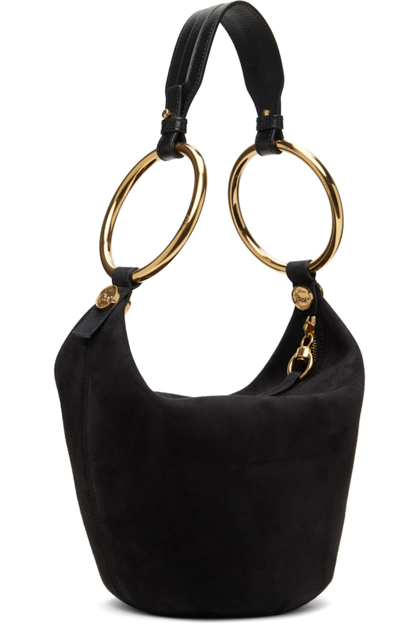 LWG-certified goatskin suede shoulder bag in black. 

· O-rings at shoulder strap
· Logo embossed at face
· Zip closure
· Card slot at interior
· Grained lambskin lining
· Logo-engraved gold-tone hardware
· H8.5" x W6.75" x D5.5"

Supplier color: Black