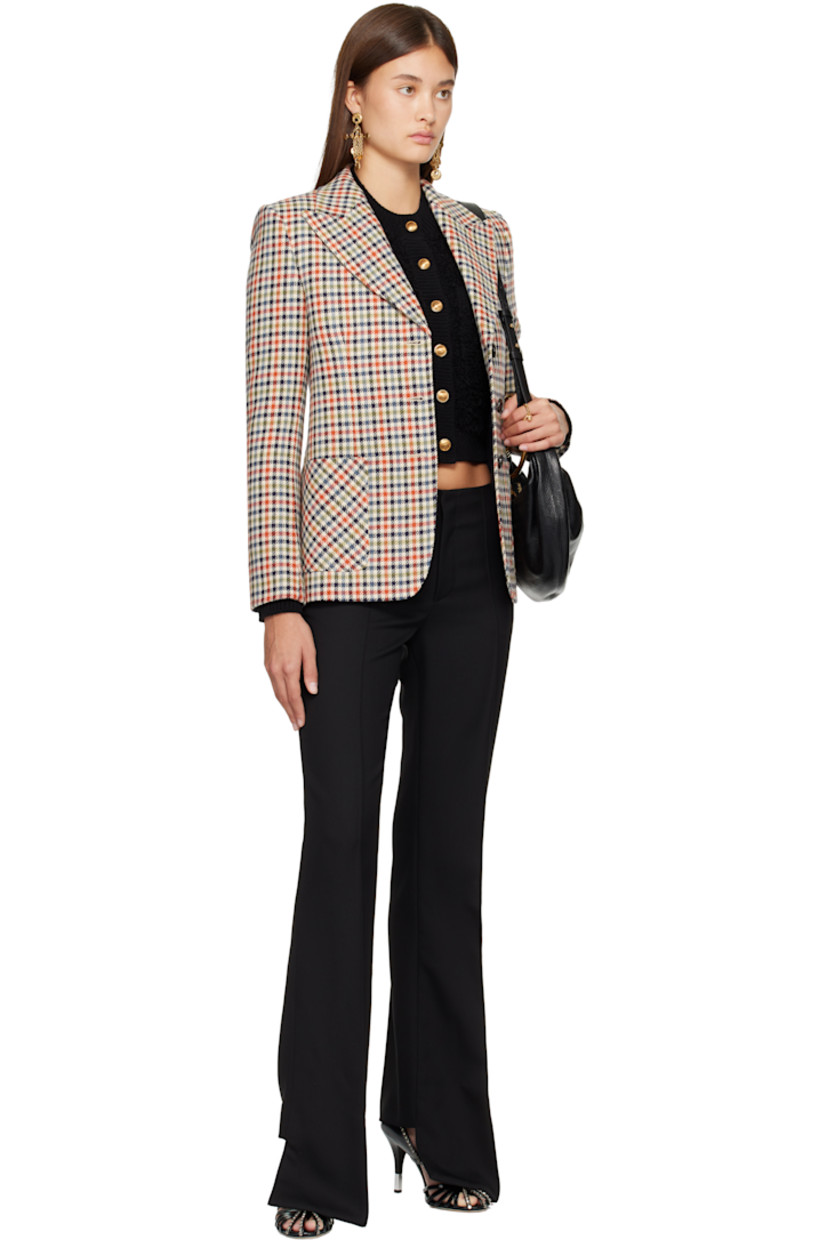 Virgin wool-blend tweed blazer.

· Check pattern throughout
· Peaked lapel
· Button closure
· Patch pockets
· Padded shoulders
· Surgeon's cuffs
· Central vent at back hem
· Full silk satin lining
· Horn hardware

Supplier color: Multicolor