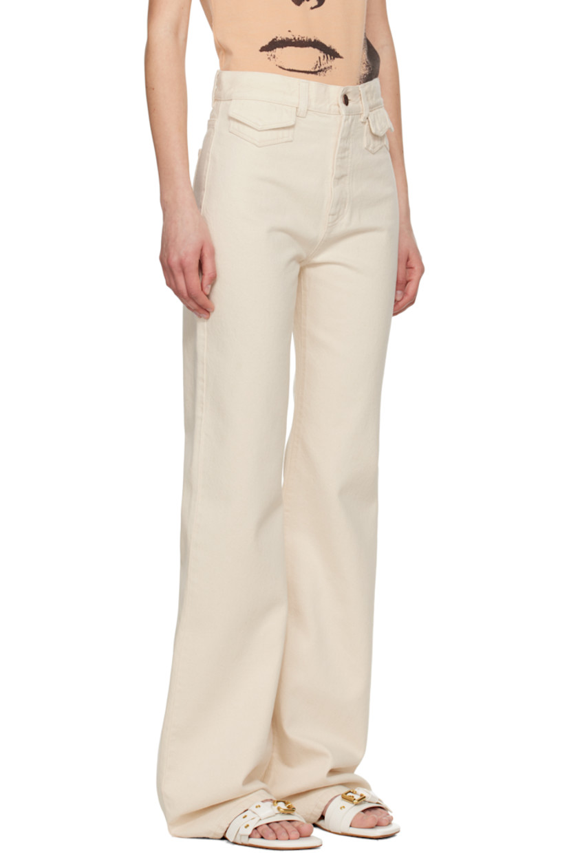 Flared non-stretch organic cotton denim jeans.

· High-rise
· Belt loops
· Five-pocket styling
· Zip fly
· Calfskin logo patch at back waistband
· Logo-engraved antiqued copper-tone hardware

Supplier color: Eden white