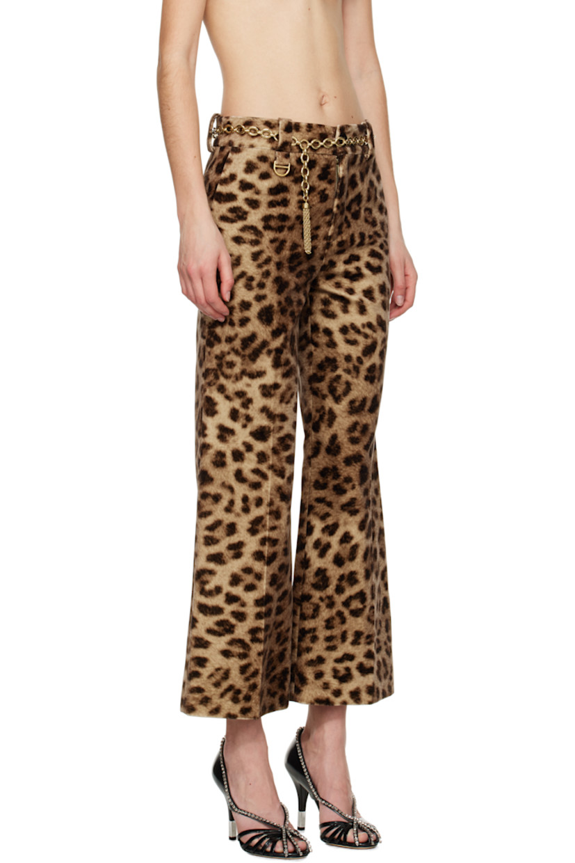 Flared cotton velvet trousers. Leopard pattern printed throughout. 

· Belt loops
· Logo-engraved D-ring at belt loop
· Two-pocket styling
· Zip fly
· Creased legs
· Cropped cuffs
· Partially lined
· Horn hardware

Supplier color: Worn brown