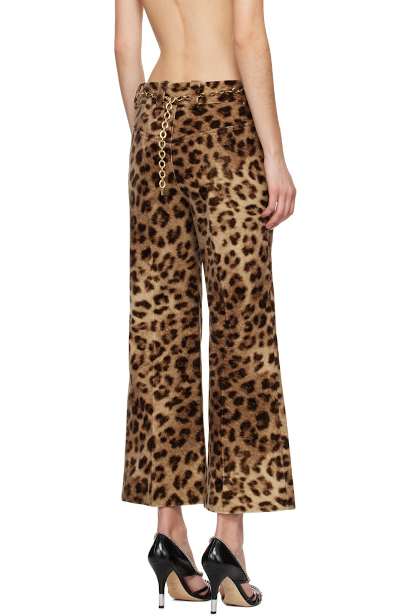Flared cotton velvet trousers. Leopard pattern printed throughout. 

· Belt loops
· Logo-engraved D-ring at belt loop
· Two-pocket styling
· Zip fly
· Creased legs
· Cropped cuffs
· Partially lined
· Horn hardware

Supplier color: Worn brown