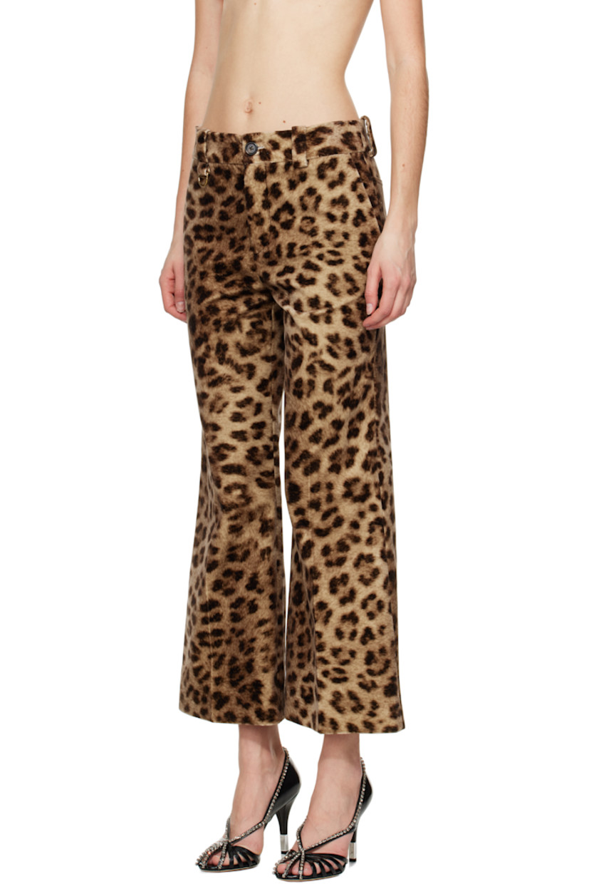 Flared cotton velvet trousers. Leopard pattern printed throughout. 

· Belt loops
· Logo-engraved D-ring at belt loop
· Two-pocket styling
· Zip fly
· Creased legs
· Cropped cuffs
· Partially lined
· Horn hardware

Supplier color: Worn brown
