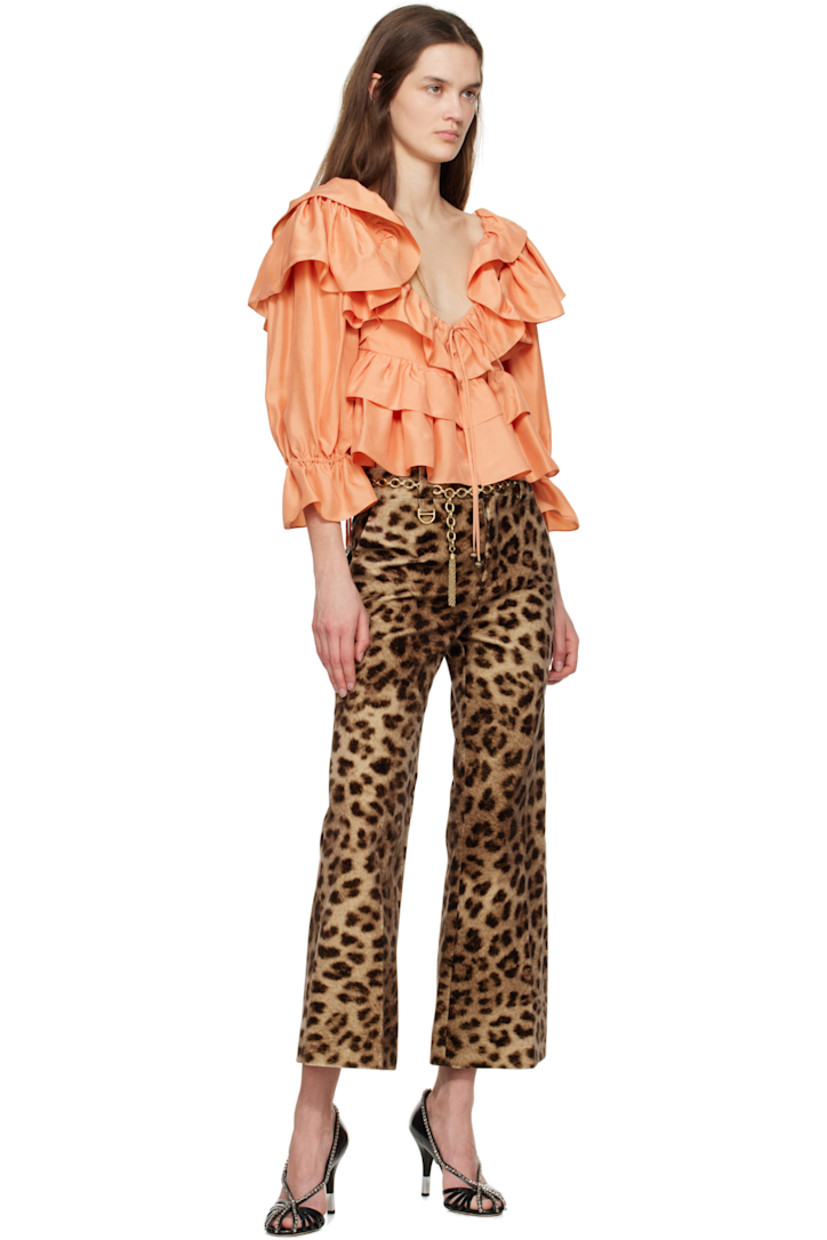 Flared cotton velvet trousers. Leopard pattern printed throughout. 

· Belt loops
· Logo-engraved D-ring at belt loop
· Two-pocket styling
· Zip fly
· Creased legs
· Cropped cuffs
· Partially lined
· Horn hardware

Supplier color: Worn brown