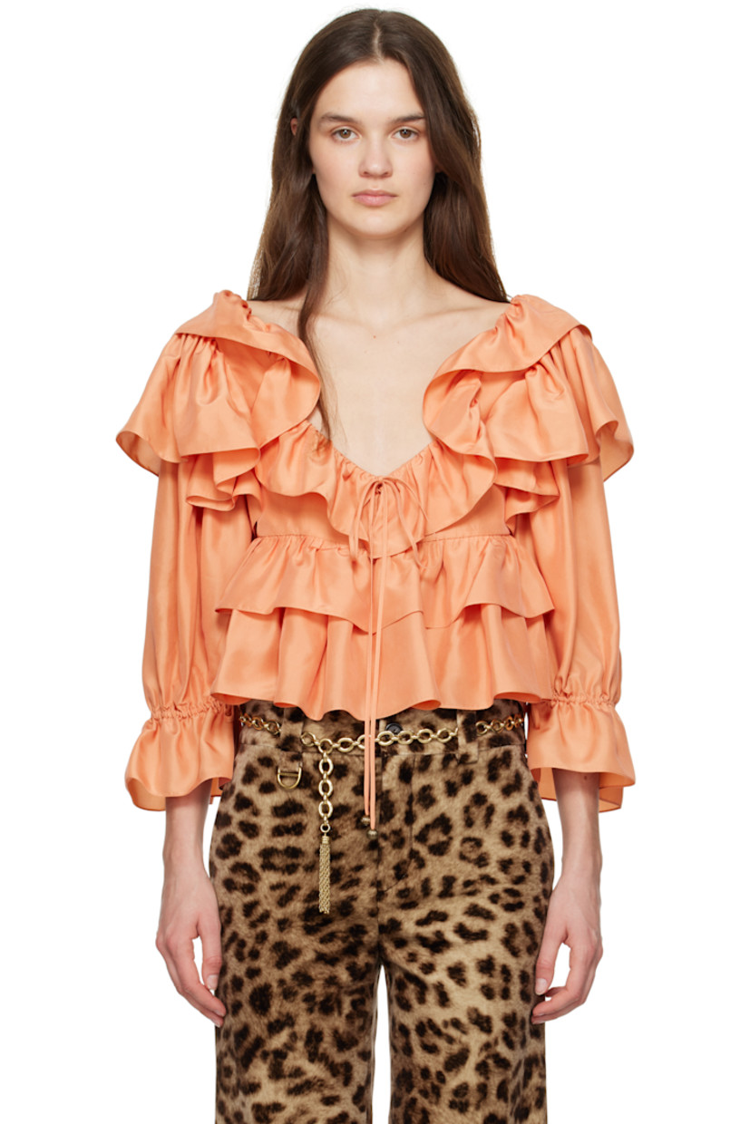 Silk poplin blouse. Ruffles throughout. 

· Self-tie fastening at scoop neck
· Three-button closure
· Tiered cropped hem
· Self-tie drawstring at flared cuffs
· Partially lined

Supplier color: Shell coral