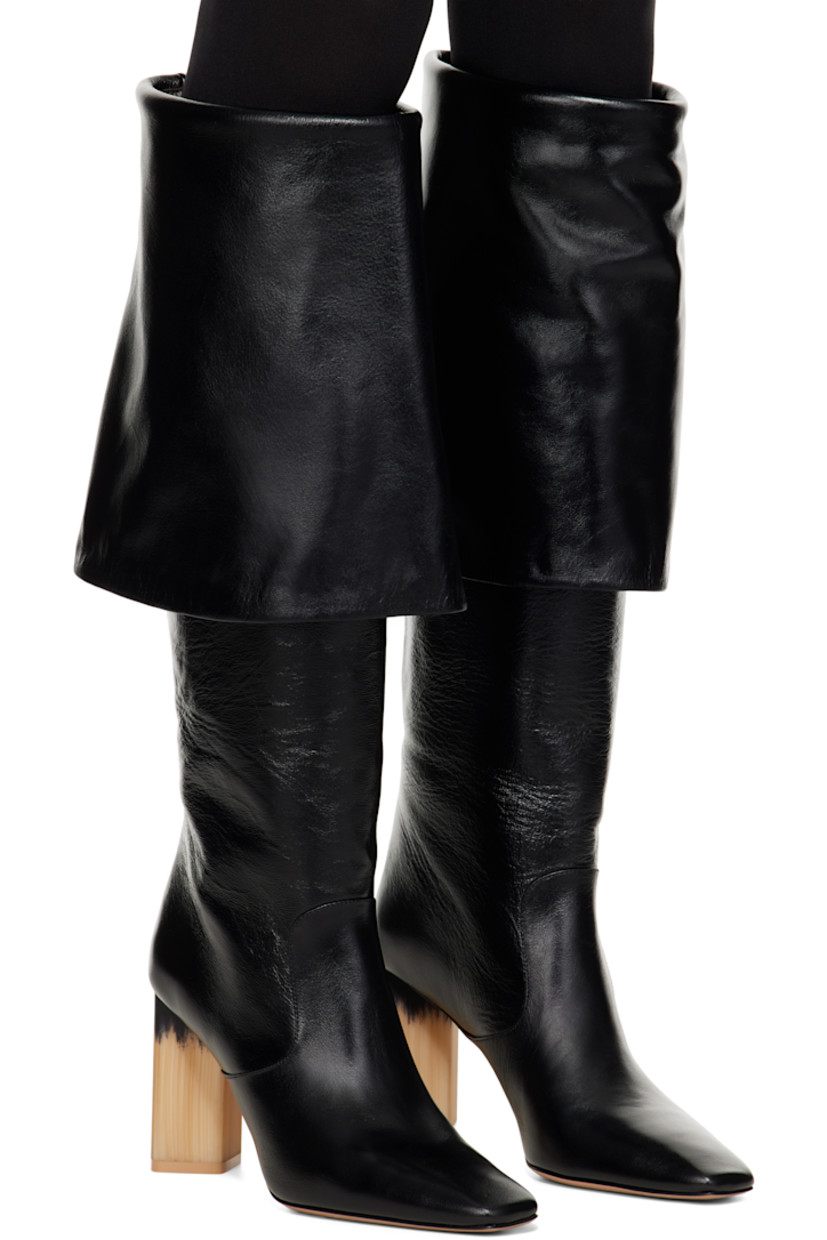 Knee-high LWG-certified grained calfskin boots in black. 

· Square toe
· Foldover collar
· Buffed lambskin lining 
· Block heel with rubber injection
· Leather sole
· Heel: H3.5"

Supplier color: Black