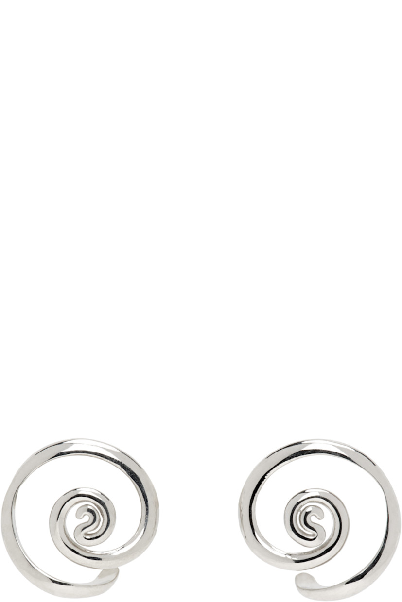 Pair of stud earrings in rhodium-plated brass.

· Post-stud fastening 
· D0.75"

Supplier color: Brass/Silver
