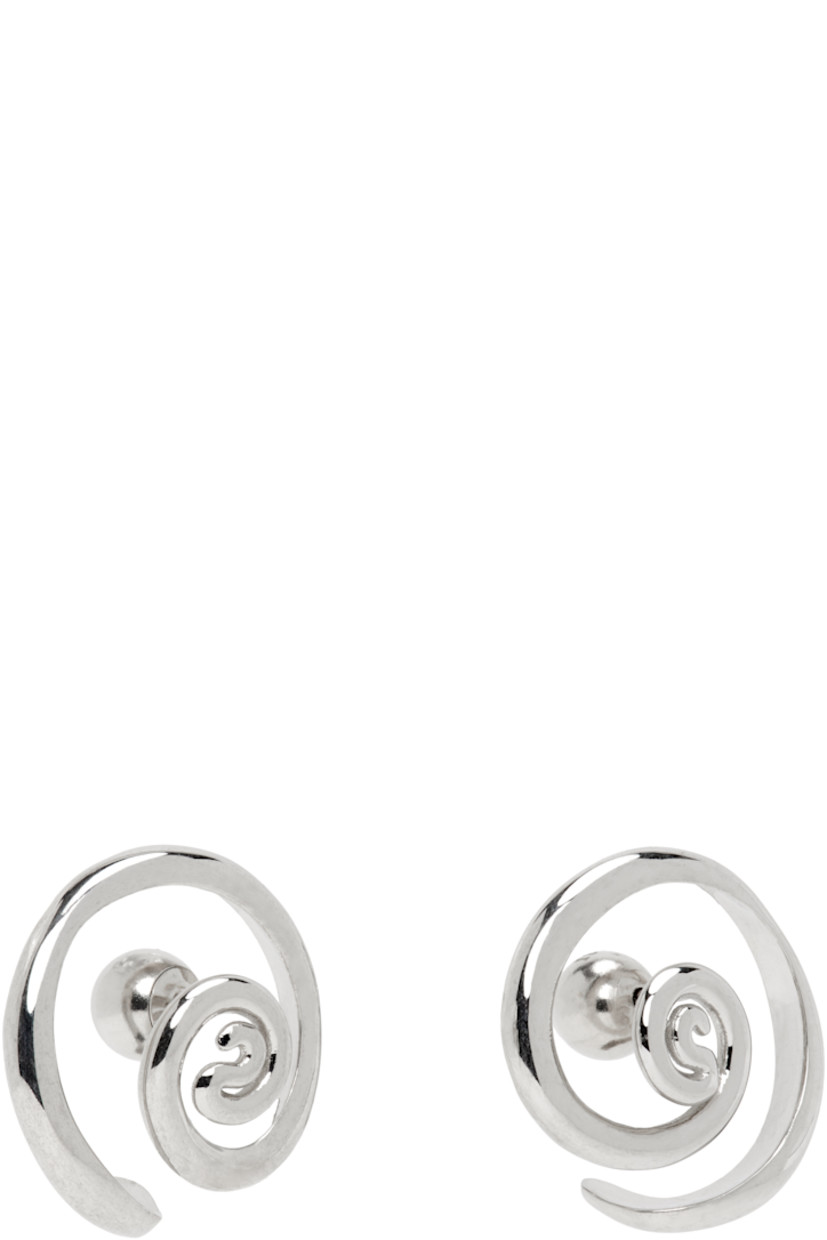 Pair of stud earrings in rhodium-plated brass.

· Post-stud fastening 
· D0.75"

Supplier color: Brass/Silver